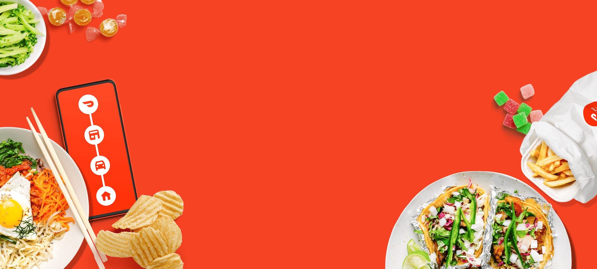 Smartphone displaying app icons surrounded by various food items on a red background